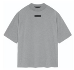 Load image into Gallery viewer, Fear of God Essentials S/S Tee Dark Heather Oatmeal
