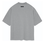 Load image into Gallery viewer, Fear of God Essentials S/S Tee Dark Heather Oatmeal
