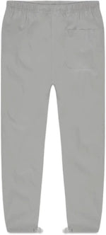 Load image into Gallery viewer, FEAR OF GOD ESSENTIALS Track Pants Silver Reflective
